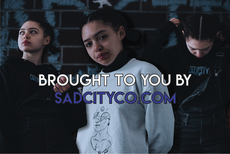 Streetwear campaign image of three models in branded hoodies with Sad City Co. type overlay
