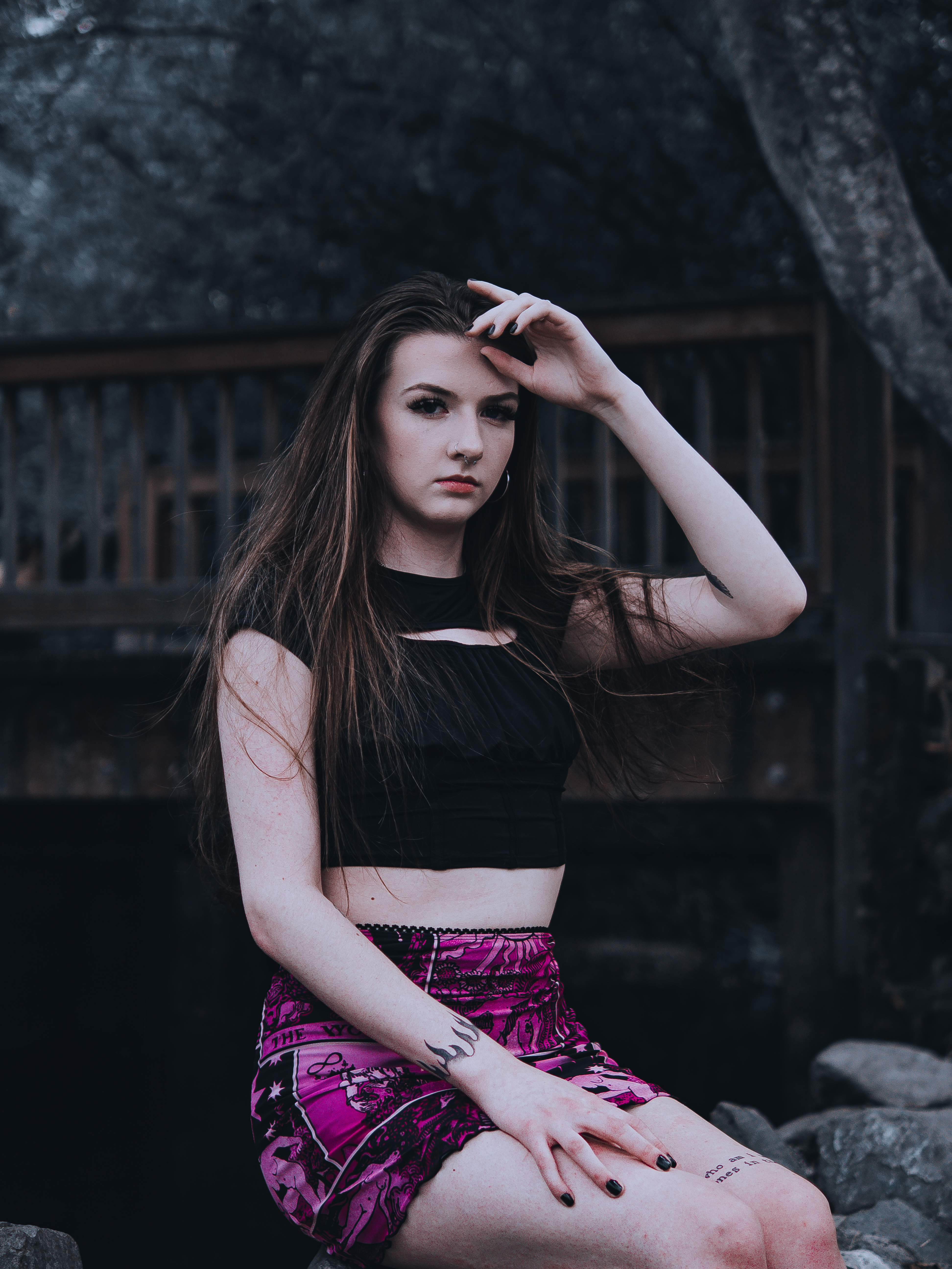 Senior seated on a cabin porch in soft natural light